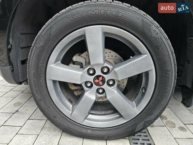 Черный Мицубиси Аутлендер, объемом двигателя 3 л и пробегом 238 тыс. км за 10800 $, фото 13 на Automoto.ua