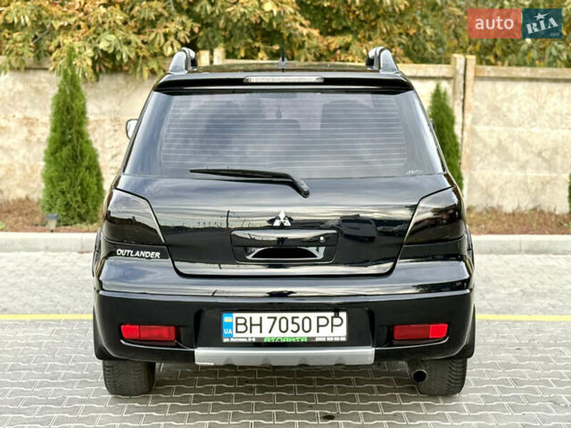 Міцубісі Аутлендер 2007 у Одесі на Automoto.ua Чорний Міцубісі Аутлендер, об'ємом двигуна 2.4 л та пробігом 201 тис. км за 7700 $, фото 11 на Automoto.ua