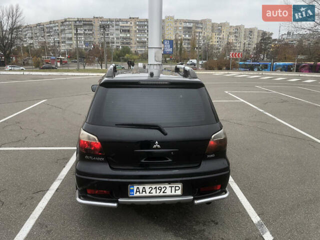 Черный Мицубиси Аутлендер, объемом двигателя 2.38 л и пробегом 314 тыс. км за 5000 $, фото 4 на Automoto.ua