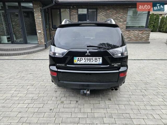 Черный Мицубиси Аутлендер, объемом двигателя 3 л и пробегом 238 тыс. км за 10800 $, фото 7 на Automoto.ua