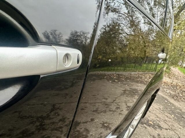 Черный Мицубиси Аутлендер, объемом двигателя 2.4 л и пробегом 230 тыс. км за 8500 $, фото 3 на Automoto.ua