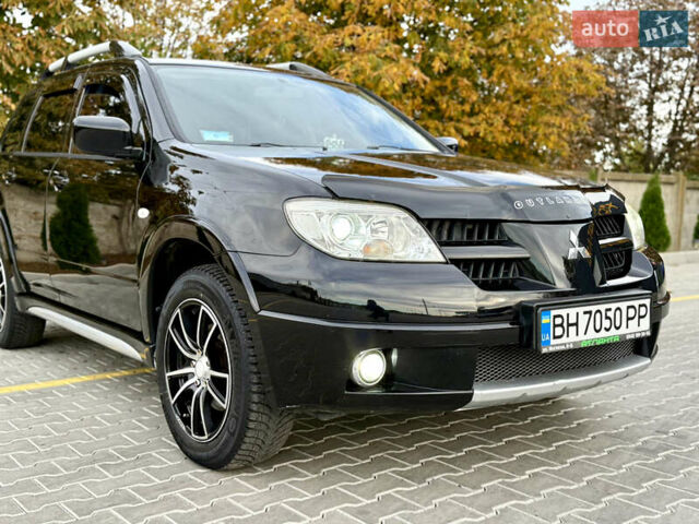 Міцубісі Аутлендер 2007 у Одесі на Automoto.ua Чорний Міцубісі Аутлендер, об'ємом двигуна 2.4 л та пробігом 201 тис. км за 7700 $, фото 3 на Automoto.ua