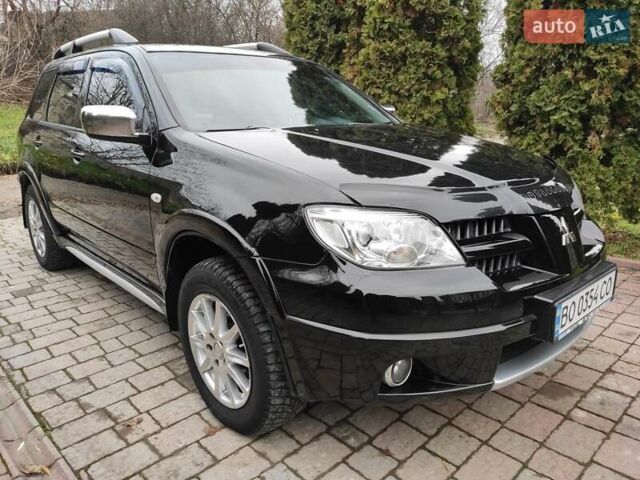 Черный Мицубиси Аутлендер, объемом двигателя 2 л и пробегом 180 тыс. км за 6000 $, фото 6 на Automoto.ua