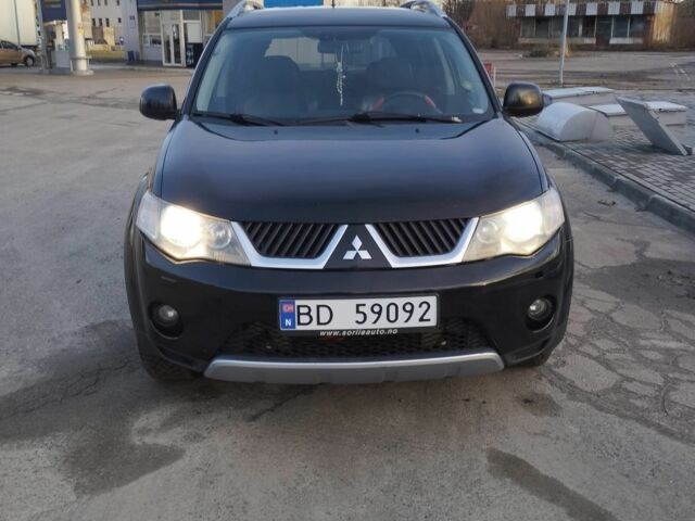 Черный Мицубиси Аутлендер, объемом двигателя 2 л и пробегом 290 тыс. км за 4900 $, фото 1 на Automoto.ua