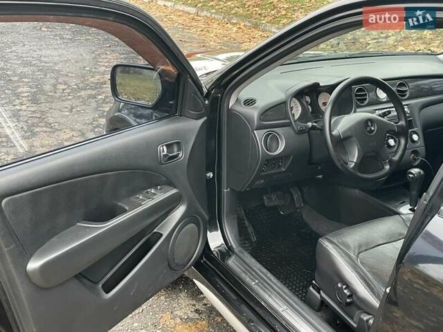 Чорний Міцубісі Аутлендер, об'ємом двигуна 2.4 л та пробігом 213 тис. км за 6850 $, фото 16 на Automoto.ua