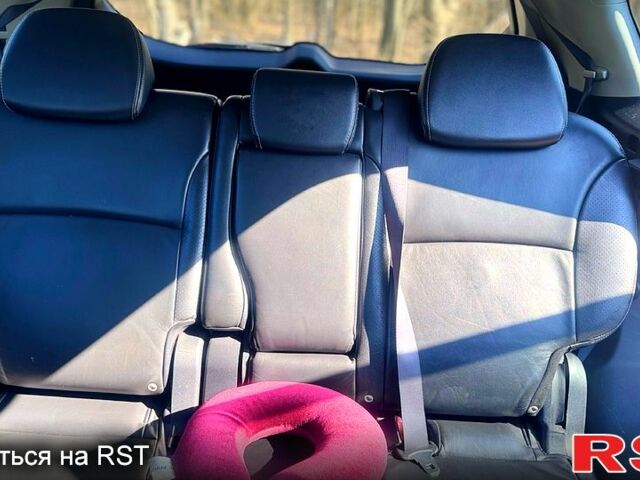 Черный Мицубиси Аутлендер, объемом двигателя 2.4 л и пробегом 155 тыс. км за 9500 $, фото 10 на Automoto.ua