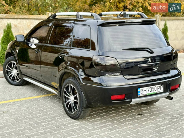 Міцубісі Аутлендер 2007 у Одесі на Automoto.ua Чорний Міцубісі Аутлендер, об'ємом двигуна 2.4 л та пробігом 201 тис. км за 7700 $, фото 23 на Automoto.ua