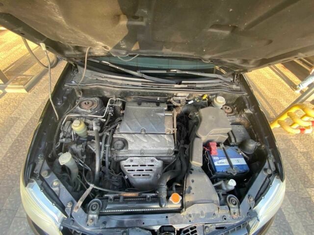 Черный Мицубиси Аутлендер, объемом двигателя 2.4 л и пробегом 219 тыс. км за 6500 $, фото 16 на Automoto.ua