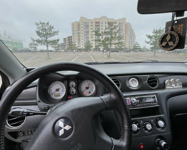 Чорний Міцубісі Аутлендер, об'ємом двигуна 2.38 л та пробігом 198 тис. км за 7100 $, фото 11 на Automoto.ua