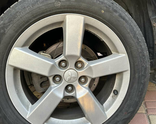 Чорний Міцубісі Аутлендер, об'ємом двигуна 3 л та пробігом 238 тис. км за 11200 $, фото 11 на Automoto.ua