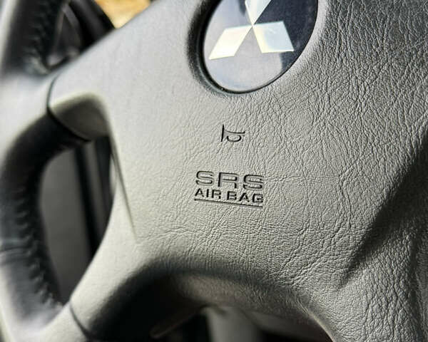 Міцубісі Аутлендер 2007 у Одесі на Automoto.ua Чорний Міцубісі Аутлендер, об'ємом двигуна 2.4 л та пробігом 201 тис. км за 7700 $, фото 74 на Automoto.ua