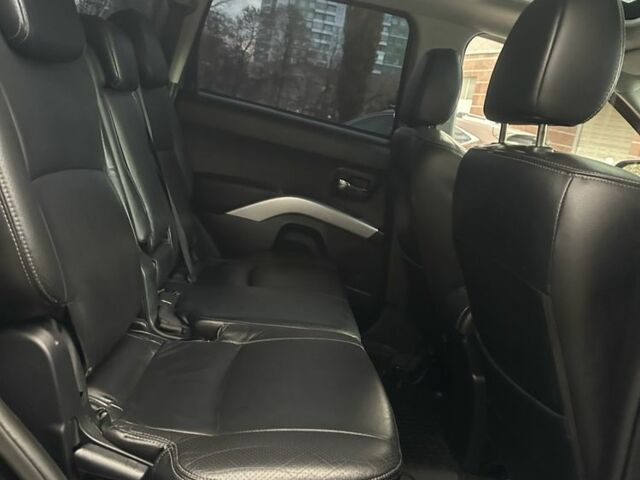 Черный Мицубиси Аутлендер, объемом двигателя 2.4 л и пробегом 230 тыс. км за 8500 $, фото 18 на Automoto.ua