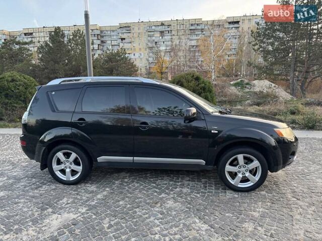 Черный Мицубиси Аутлендер, объемом двигателя 3 л и пробегом 205 тыс. км за 11300 $, фото 5 на Automoto.ua