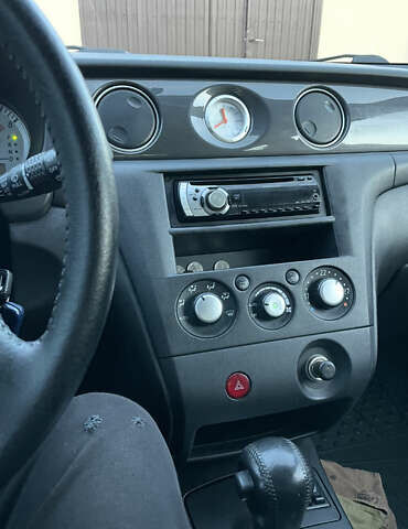 Черный Мицубиси Аутлендер, объемом двигателя 2.38 л и пробегом 118 тыс. км за 6850 $, фото 5 на Automoto.ua