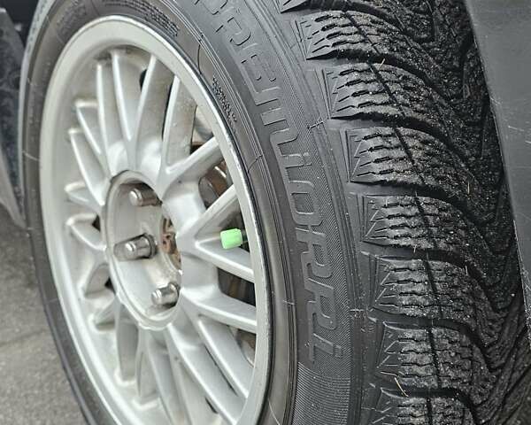 Чорний Міцубісі Аутлендер, об'ємом двигуна 2 л та пробігом 290 тис. км за 5000 $, фото 16 на Automoto.ua