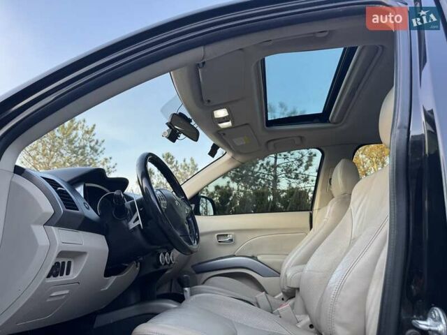 Черный Мицубиси Аутлендер, объемом двигателя 3 л и пробегом 205 тыс. км за 11300 $, фото 12 на Automoto.ua