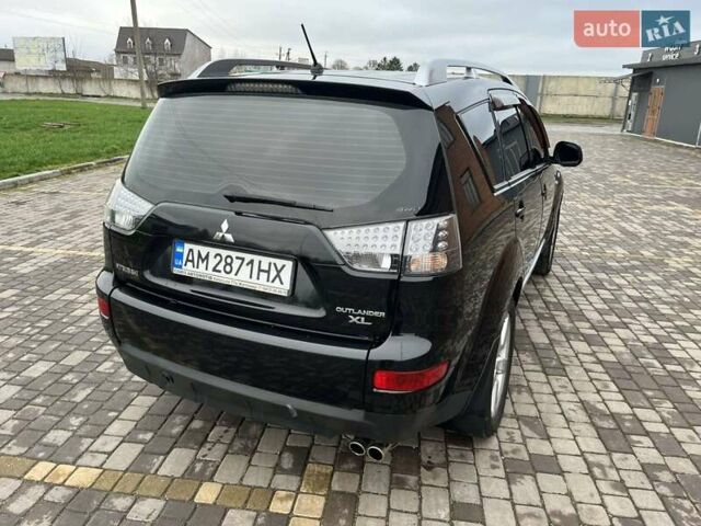 Черный Мицубиси Аутлендер, объемом двигателя 3 л и пробегом 200 тыс. км за 7999 $, фото 16 на Automoto.ua