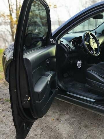 Черный Мицубиси Аутлендер, объемом двигателя 3 л и пробегом 190 тыс. км за 10000 $, фото 24 на Automoto.ua