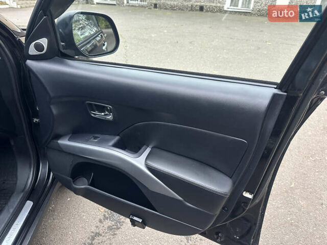 Чорний Міцубісі Аутлендер, об'ємом двигуна 2.4 л та пробігом 230 тис. км за 8300 $, фото 23 на Automoto.ua