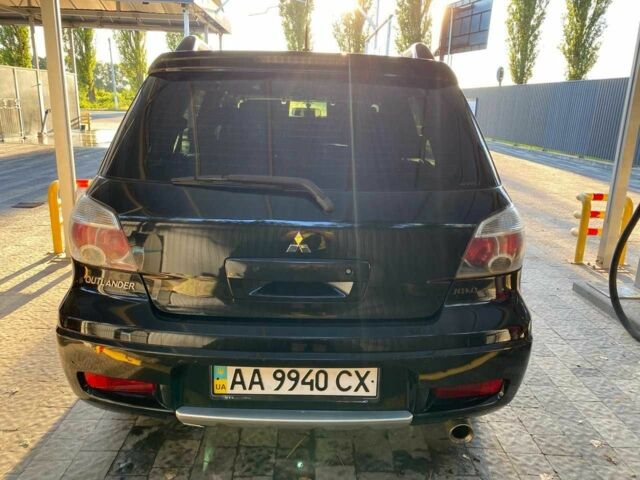 Черный Мицубиси Аутлендер, объемом двигателя 2.4 л и пробегом 219 тыс. км за 6500 $, фото 9 на Automoto.ua