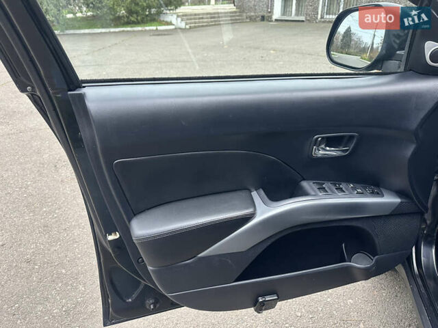Чорний Міцубісі Аутлендер, об'ємом двигуна 2.4 л та пробігом 230 тис. км за 8300 $, фото 18 на Automoto.ua