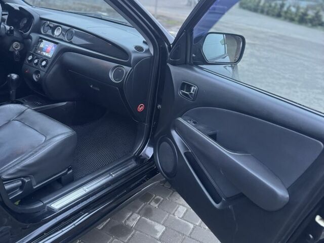 Чорний Міцубісі Аутлендер, об'ємом двигуна 2.4 л та пробігом 202 тис. км за 5800 $, фото 13 на Automoto.ua