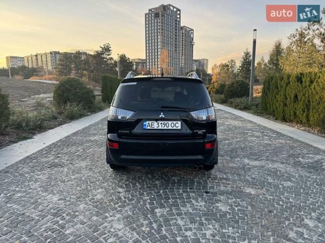 Черный Мицубиси Аутлендер, объемом двигателя 3 л и пробегом 205 тыс. км за 11300 $, фото 3 на Automoto.ua