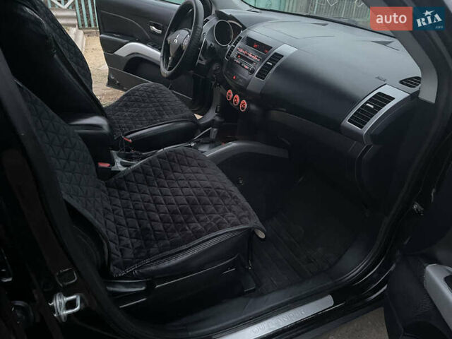 Черный Мицубиси Аутлендер, объемом двигателя 3 л и пробегом 265 тыс. км за 9200 $, фото 13 на Automoto.ua