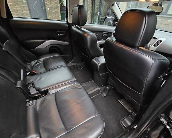 Черный Мицубиси Аутлендер, объемом двигателя 3 л и пробегом 238 тыс. км за 10800 $, фото 33 на Automoto.ua