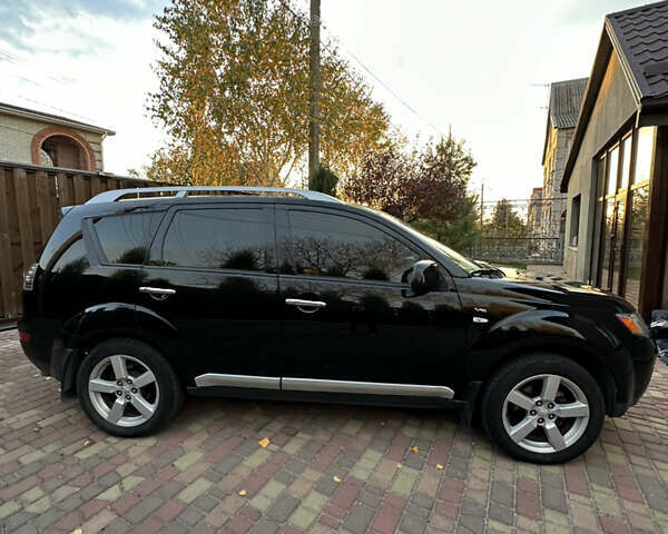 Чорний Міцубісі Аутлендер, об'ємом двигуна 3 л та пробігом 238 тис. км за 11200 $, фото 6 на Automoto.ua
