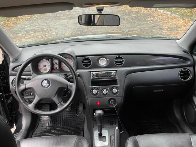 Черный Мицубиси Аутлендер, объемом двигателя 2.4 л и пробегом 213 тыс. км за 6850 $, фото 17 на Automoto.ua