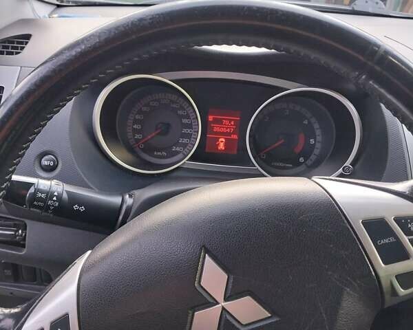 Чорний Міцубісі Аутлендер, об'ємом двигуна 1.97 л та пробігом 350 тис. км за 7888 $, фото 5 на Automoto.ua