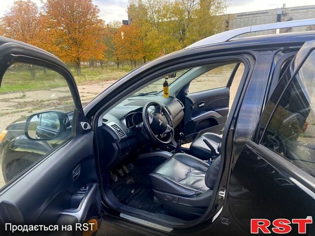 Черный Мицубиси Аутлендер, объемом двигателя 2 л и пробегом 207 тыс. км за 8100 $, фото 7 на Automoto.ua