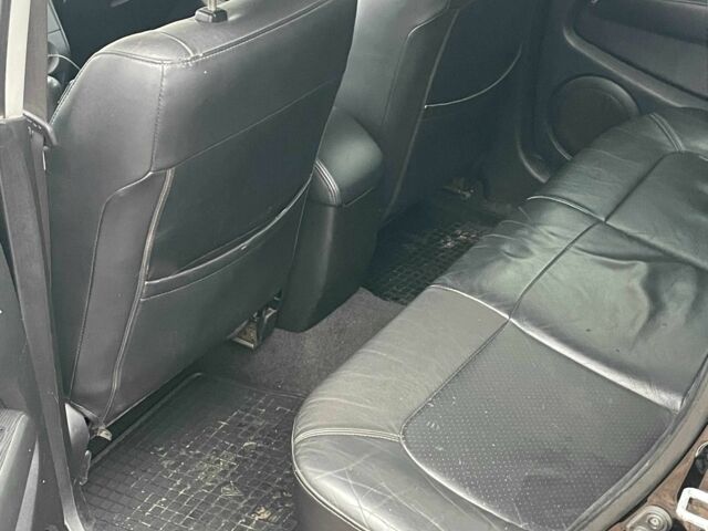 Черный Мицубиси Аутлендер, объемом двигателя 2.4 л и пробегом 213 тыс. км за 6850 $, фото 19 на Automoto.ua