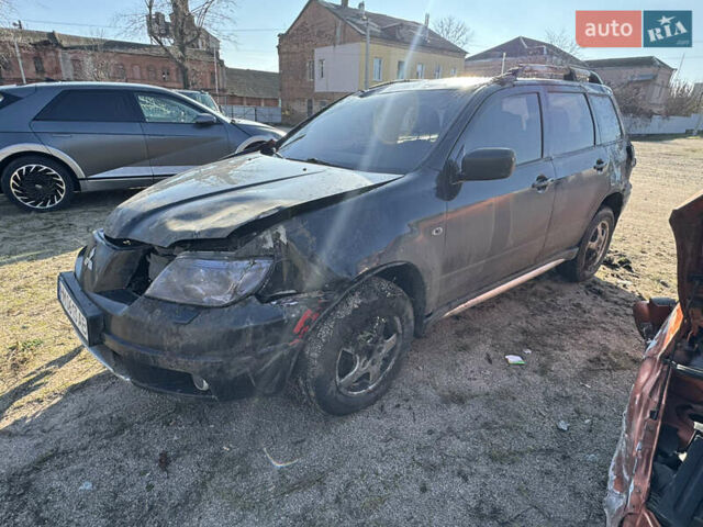 Черный Мицубиси Аутлендер, объемом двигателя 2 л и пробегом 258 тыс. км за 2200 $, фото 11 на Automoto.ua