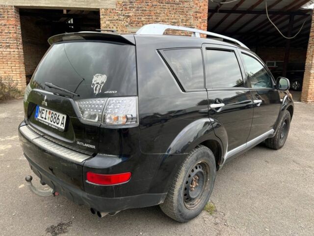 Черный Мицубиси Аутлендер, объемом двигателя 2.2 л и пробегом 190 тыс. км за 4800 $, фото 1 на Automoto.ua