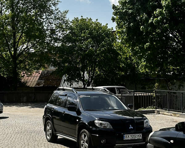 Чорний Міцубісі Аутлендер, об'ємом двигуна 2 л та пробігом 178 тис. км за 10000 $, фото 3 на Automoto.ua