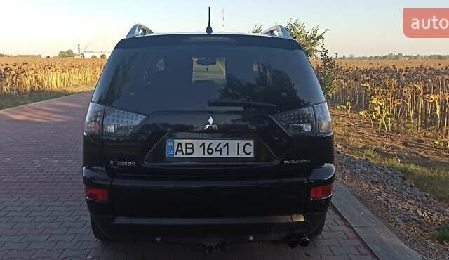 Черный Мицубиси Аутлендер, объемом двигателя 1.97 л и пробегом 244 тыс. км за 9000 $, фото 3 на Automoto.ua