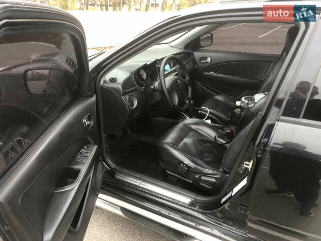 Черный Мицубиси Аутлендер, объемом двигателя 2.38 л и пробегом 314 тыс. км за 5000 $, фото 7 на Automoto.ua