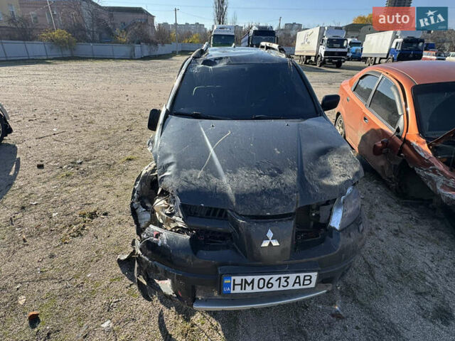Черный Мицубиси Аутлендер, объемом двигателя 2 л и пробегом 258 тыс. км за 2200 $, фото 9 на Automoto.ua