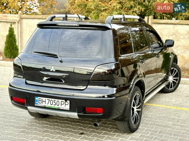 Міцубісі Аутлендер 2007 у Одесі на Automoto.ua Чорний Міцубісі Аутлендер, об'ємом двигуна 2.4 л та пробігом 201 тис. км за 7700 $, фото 9 на Automoto.ua