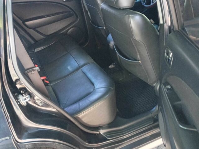 Черный Мицубиси Аутлендер, объемом двигателя 2.4 л и пробегом 248 тыс. км за 7000 $, фото 5 на Automoto.ua