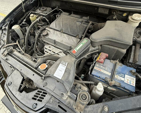 Міцубісі Аутлендер 2007 у Одесі на Automoto.ua Чорний Міцубісі Аутлендер, об'ємом двигуна 2.4 л та пробігом 201 тис. км за 7700 $, фото 81 на Automoto.ua