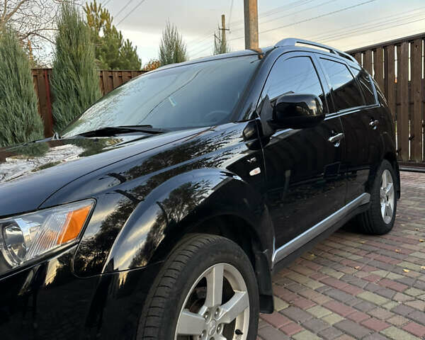 Чорний Міцубісі Аутлендер, об'ємом двигуна 3 л та пробігом 238 тис. км за 11200 $, фото 2 на Automoto.ua