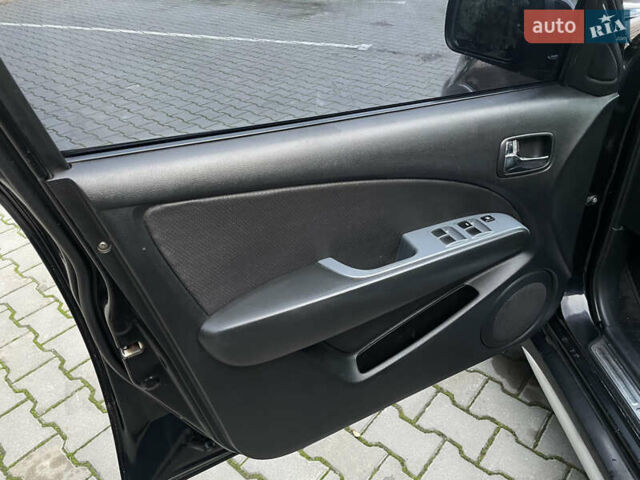 Черный Мицубиси Аутлендер, объемом двигателя 2.4 л и пробегом 248 тыс. км за 7300 $, фото 8 на Automoto.ua