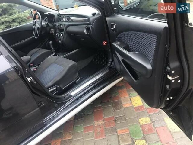 Черный Мицубиси Аутлендер, объемом двигателя 2 л и пробегом 284 тыс. км за 4999 $, фото 5 на Automoto.ua