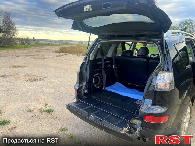 Черный Мицубиси Аутлендер, объемом двигателя 2 л и пробегом 207 тыс. км за 8100 $, фото 10 на Automoto.ua