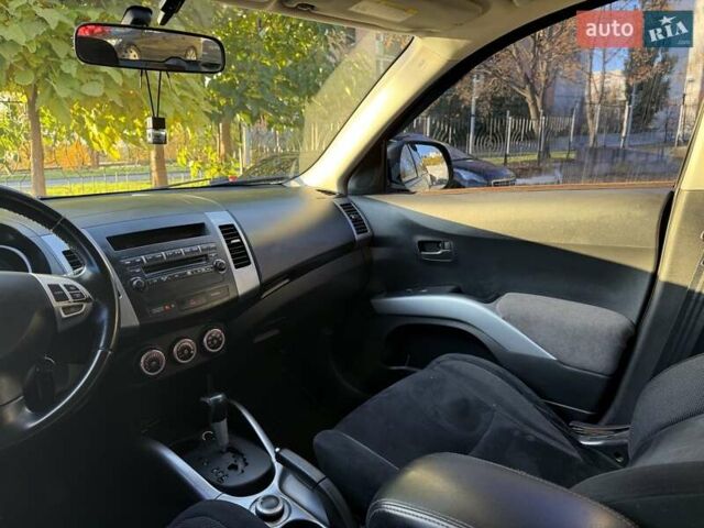 Черный Мицубиси Аутлендер, объемом двигателя 3 л и пробегом 198 тыс. км за 9500 $, фото 14 на Automoto.ua