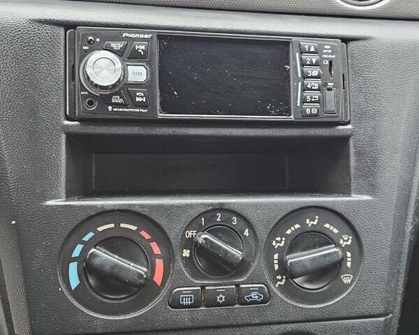 Чорний Міцубісі Аутлендер, об'ємом двигуна 2 л та пробігом 290 тис. км за 4200 $, фото 13 на Automoto.ua