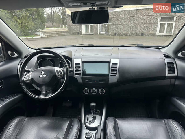 Чорний Міцубісі Аутлендер, об'ємом двигуна 2.4 л та пробігом 230 тис. км за 8300 $, фото 20 на Automoto.ua
